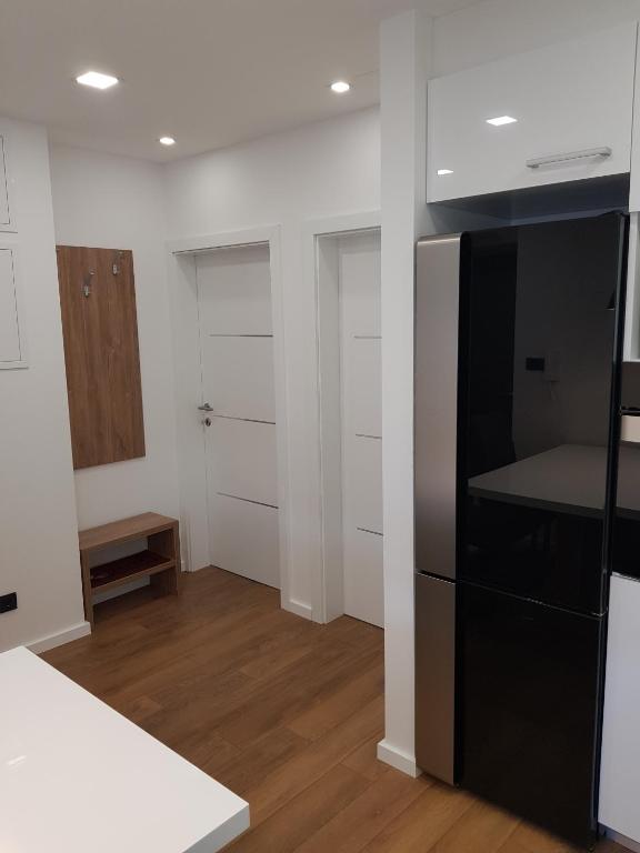 Łóżko lub łóżka w pokoju w obiekcie MarSim Lux apartman Zagreb