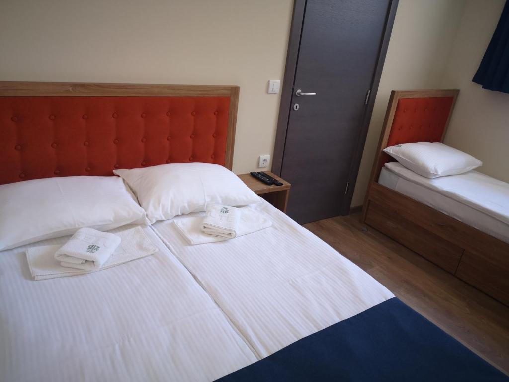 Postel nebo postele na pokoji v ubytování Apartments&Camping ZIP