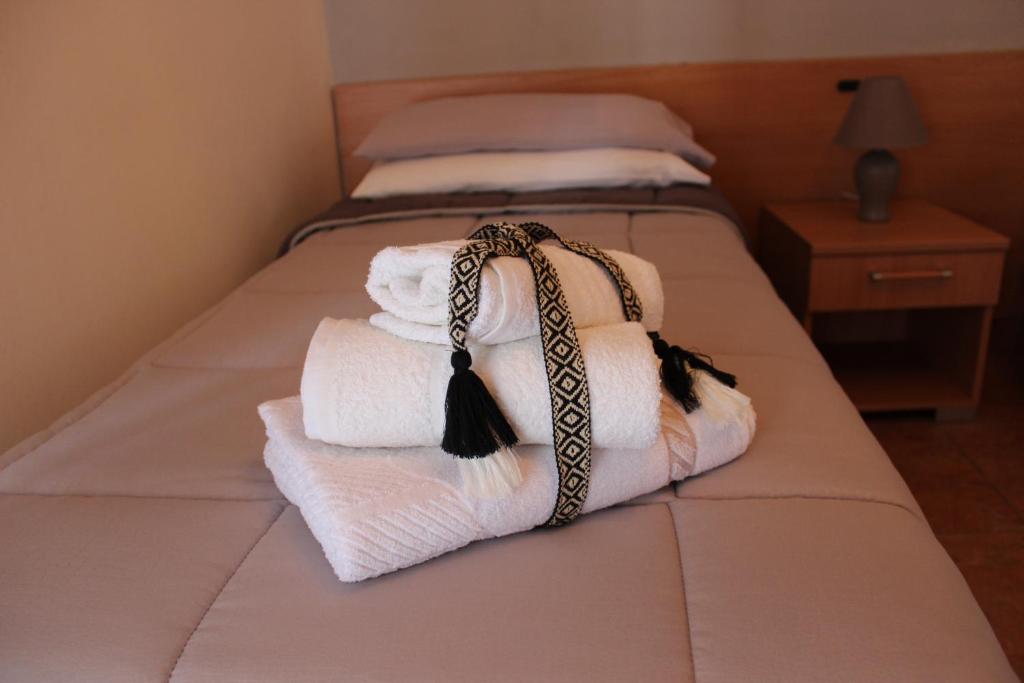 Postel nebo postele na pokoji v ubytování B&B La Vigna