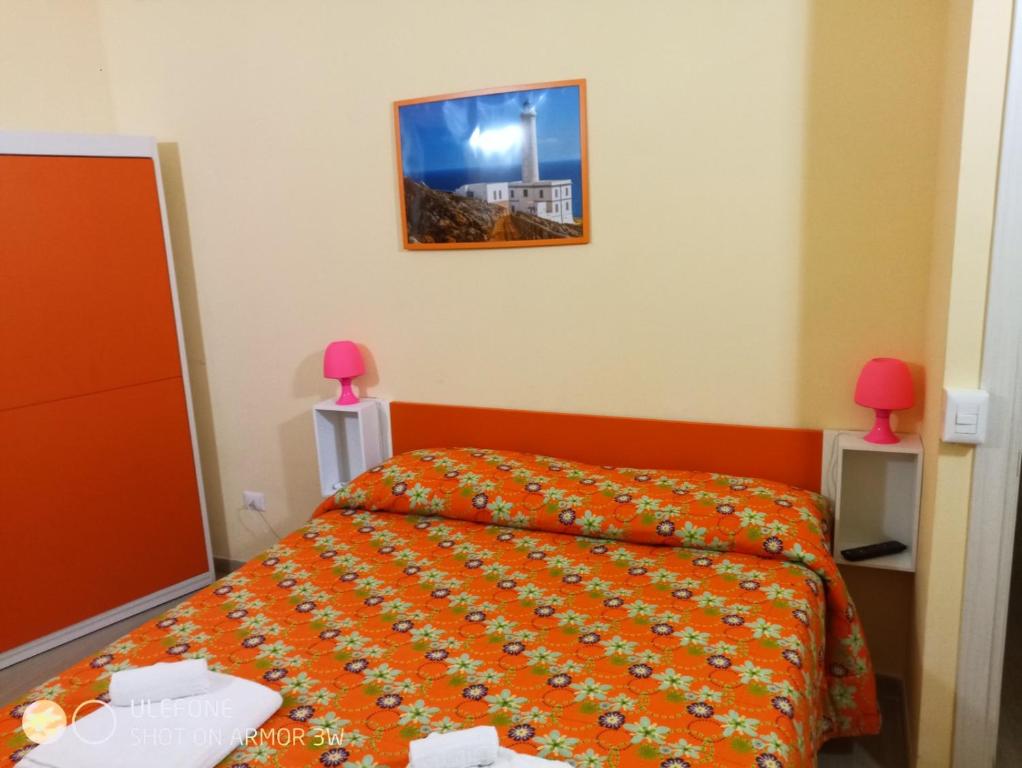 Llit o llits en una habitació de Bed & Breakfast Le Torri