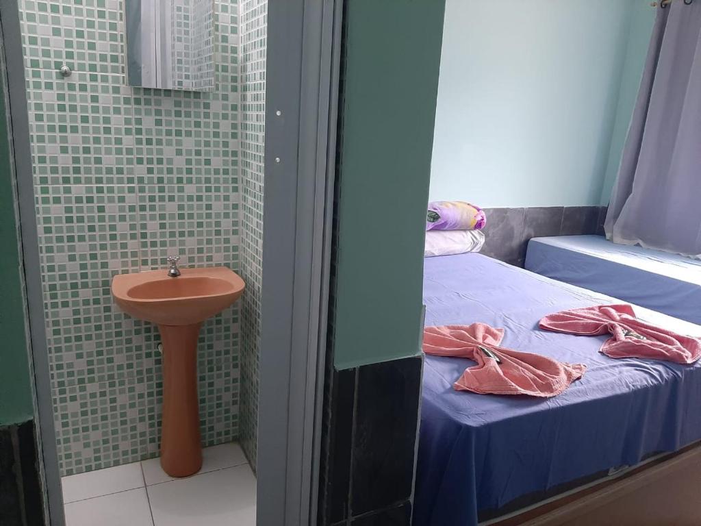 Postel nebo postele na pokoji v ubytování 388 Suítes & Flats