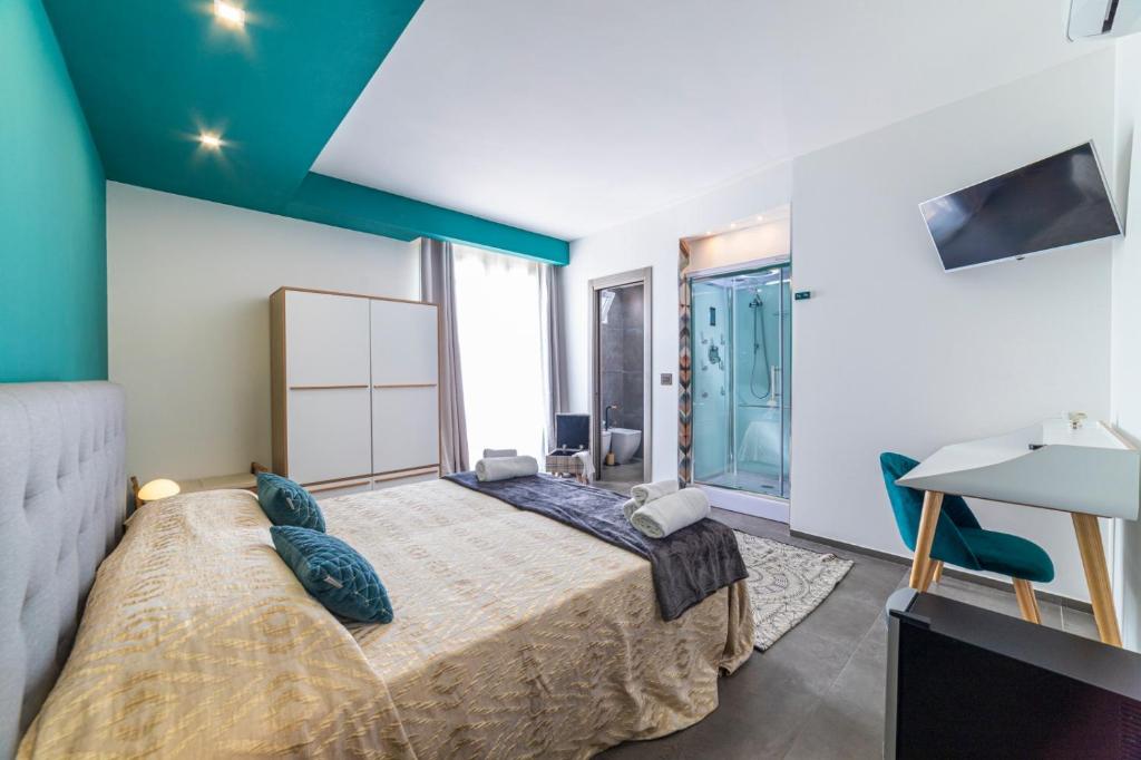 Postel nebo postele na pokoji v ubytování Albergo Piazza Risorgimento