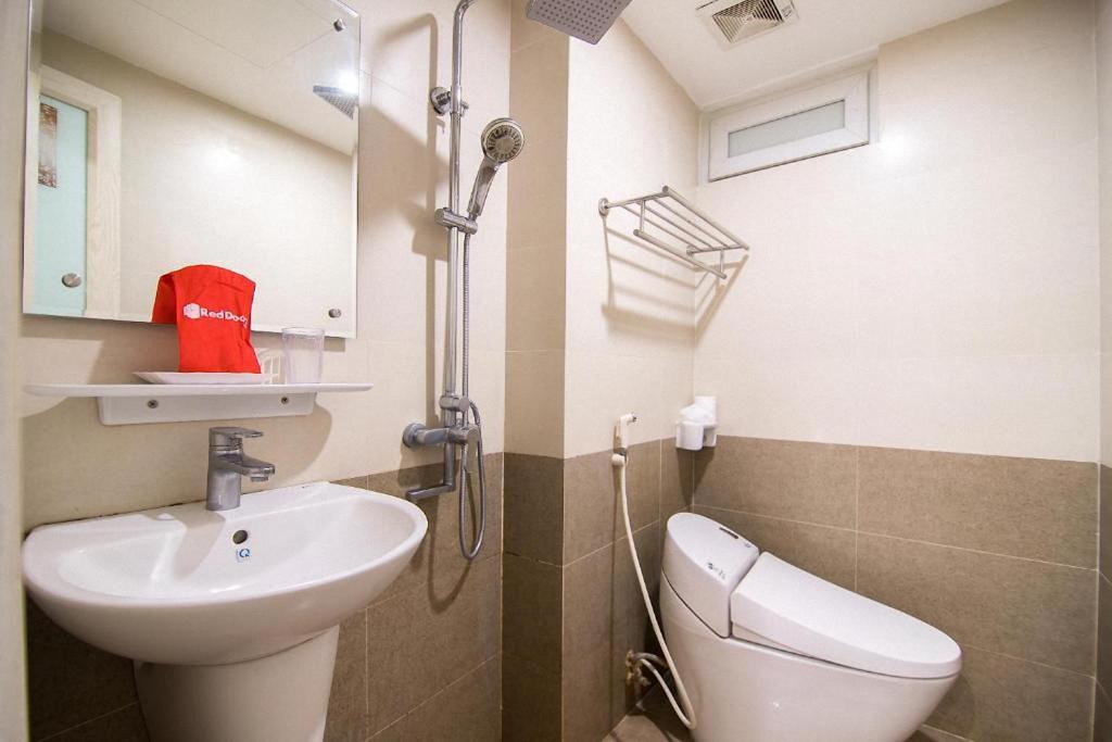 Koupelna v ubytování Galaxy Hanoi Hotel & Apartment - 12 ngõ 80 Trần Duy Hưng