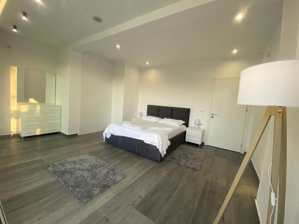 Postel nebo postele na pokoji v ubytování White Beach Villa 1 - Luxury