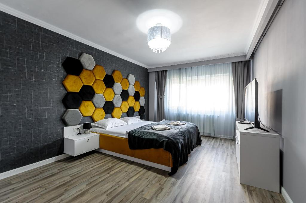 Giường trong phòng chung tại Feeling Home Apartment