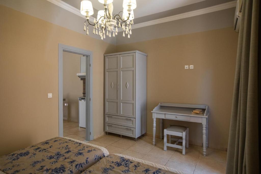 Postel nebo postele na pokoji v ubytování Pelagos Apartments