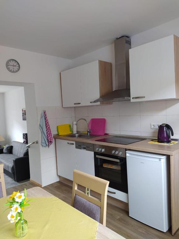 Kuchyň nebo kuchyňský kout v ubytování Ferienhaus Middenmank