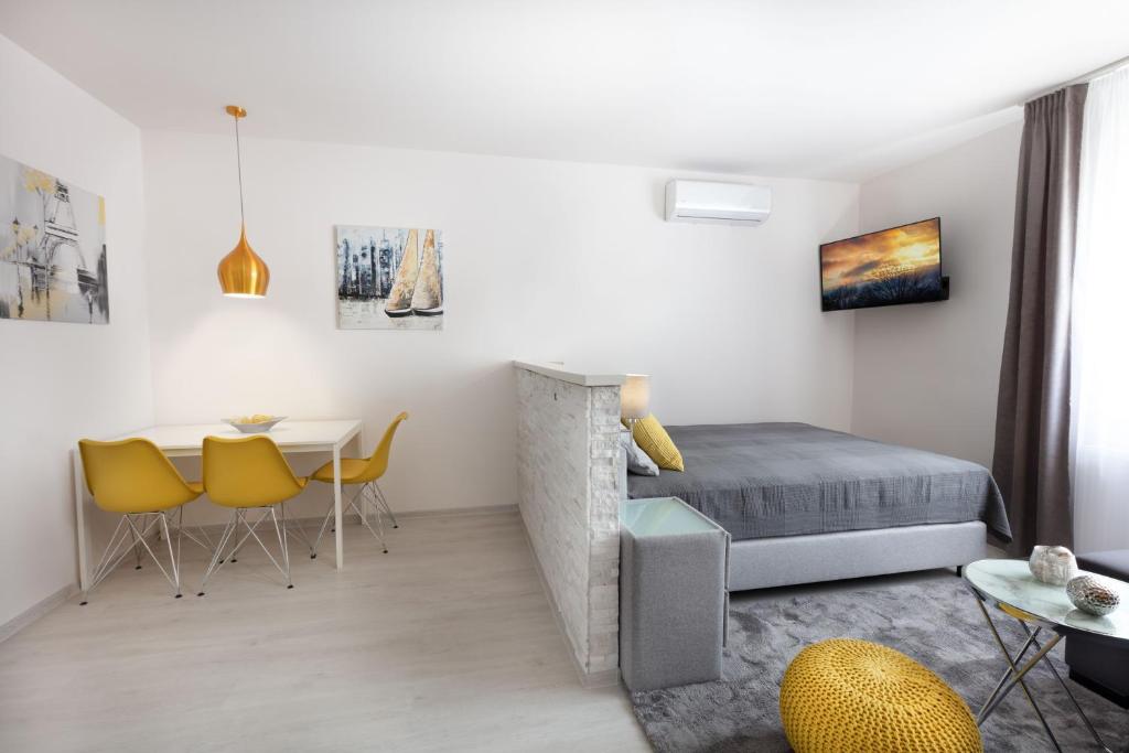 Posezení v ubytování Trend Apartmanház -Vizslás