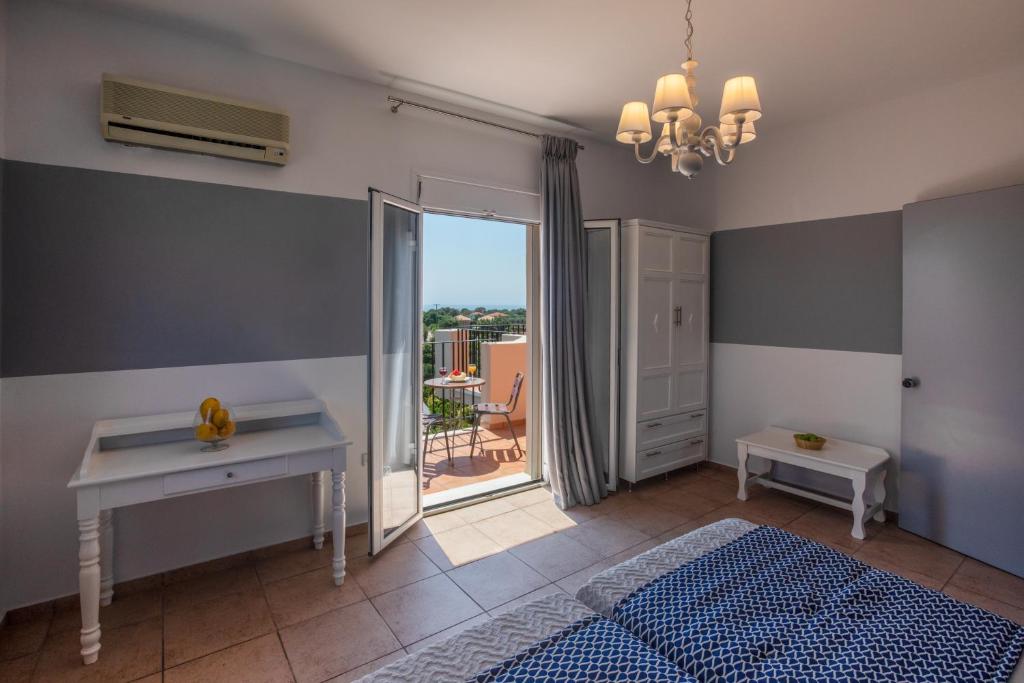 Postel nebo postele na pokoji v ubytování Pelagos Apartments