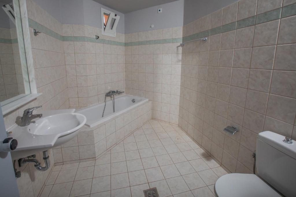 Koupelna v ubytování Pelagos Apartments