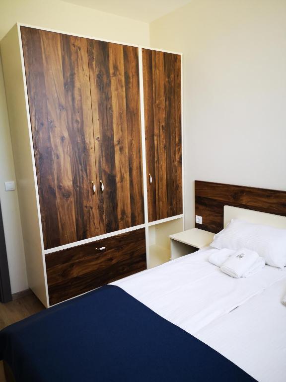 Postel nebo postele na pokoji v ubytování Apartments&Camping ZIP