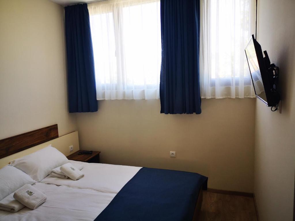 Postel nebo postele na pokoji v ubytování Apartments&Camping ZIP