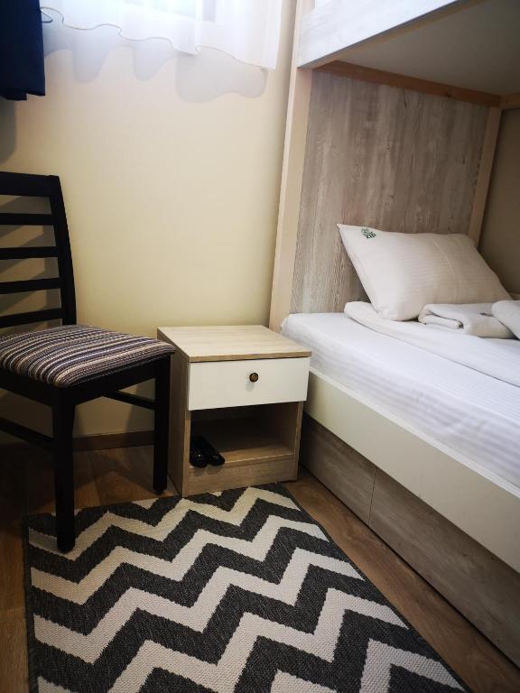 Postel nebo postele na pokoji v ubytování Apartments&Camping ZIP