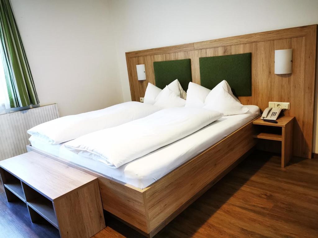 Postel nebo postele na pokoji v ubytování Pension Bergwelt