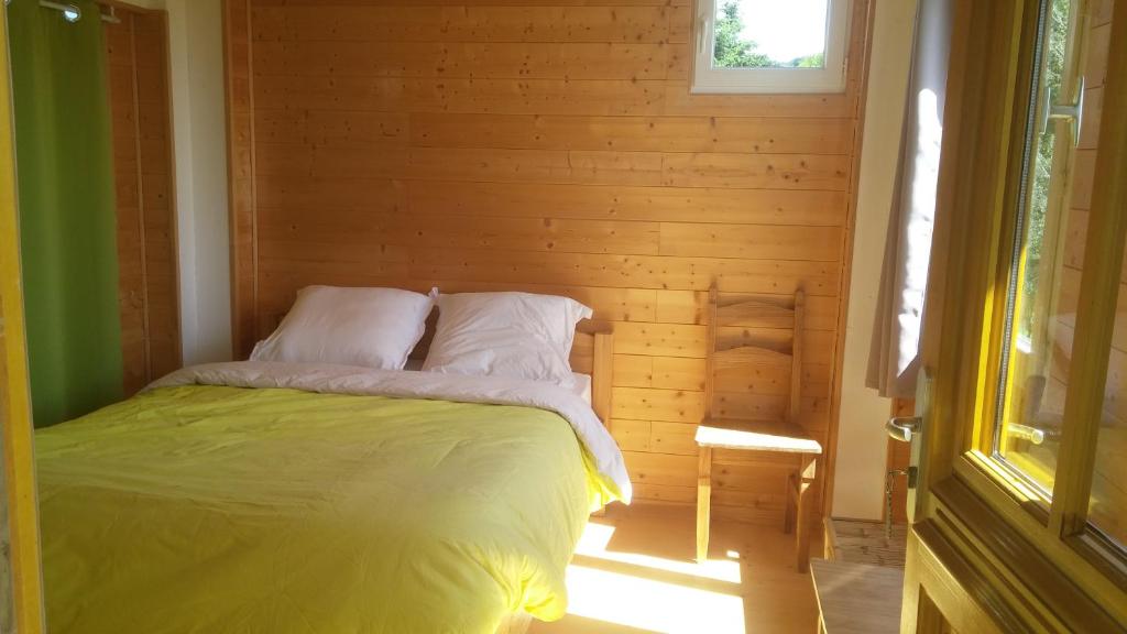 Postel nebo postele na pokoji v ubytování L'insolite du pic d'Ysson