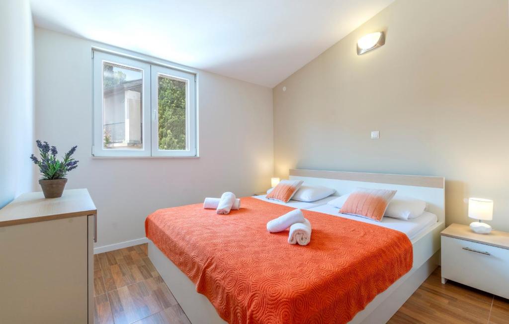 Postel nebo postele na pokoji v ubytování Apartments Listes