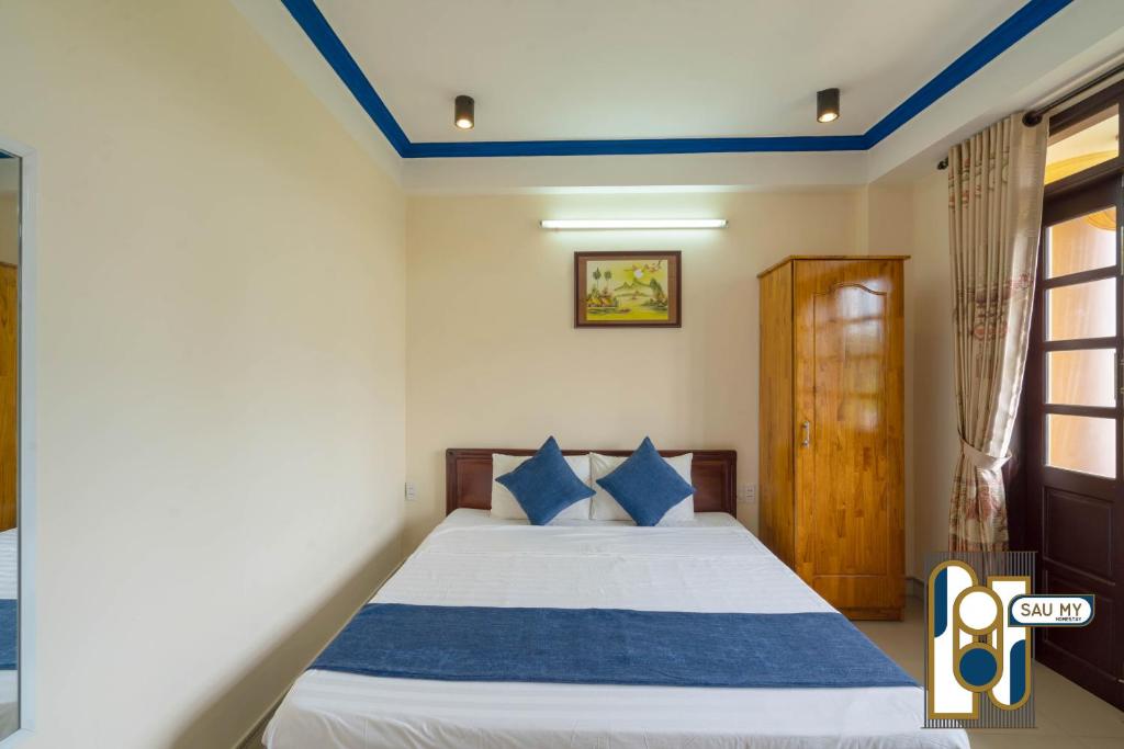 Postel nebo postele na pokoji v ubytování Sau My Homestay