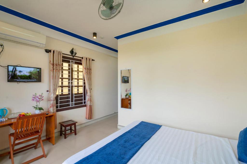 Postel nebo postele na pokoji v ubytování Sau My Homestay