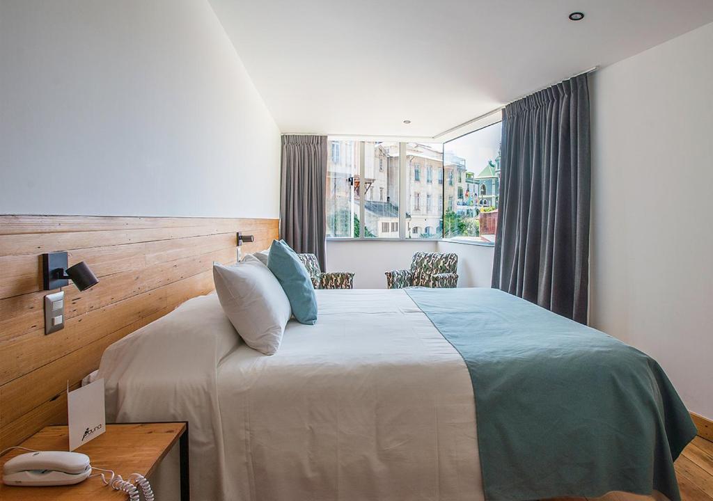 Postel nebo postele na pokoji v ubytování Fauna Hotel