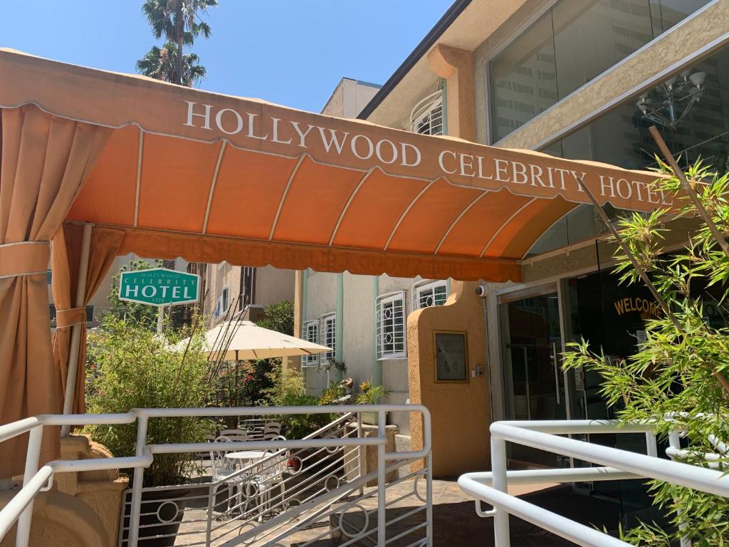 
a building that has a sign on the side of it at Hollywood Celebrity Hotel in Los Angeles
