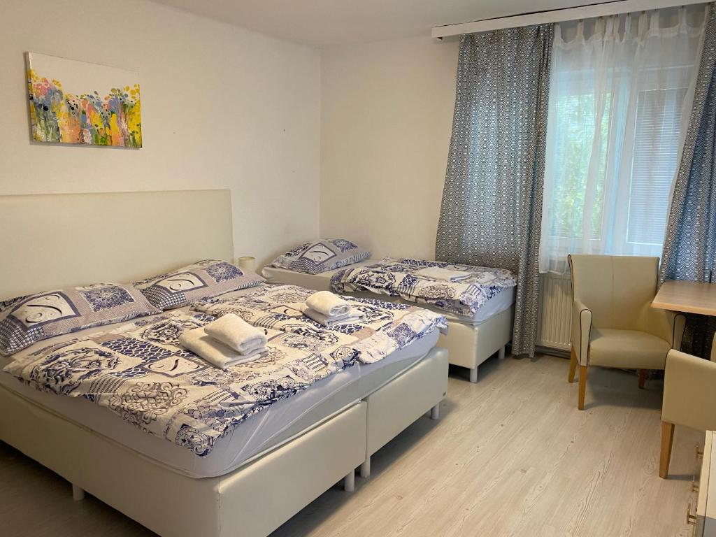 Postel nebo postele na pokoji v ubytování Penzión Oáza