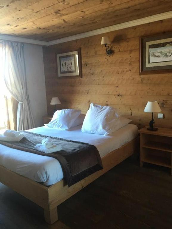 Postel nebo postele na pokoji v ubytování Alp'azur