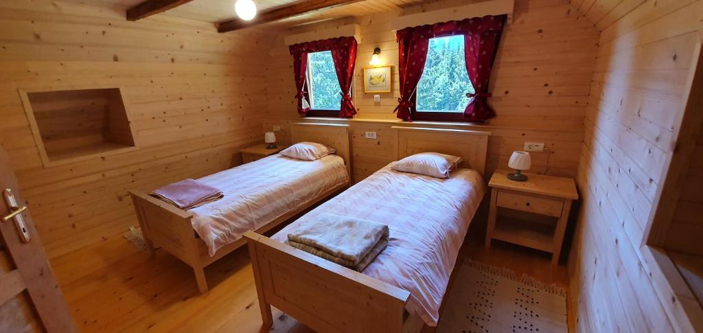 Postel nebo postele na pokoji v ubytování Prbajtnjeko
