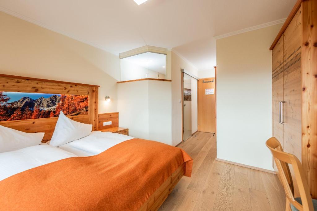 Postel nebo postele na pokoji v ubytování Aparthotel Ramsau