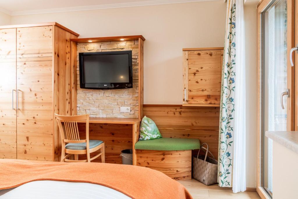TV a/nebo společenská místnost v ubytování Aparthotel Ramsau