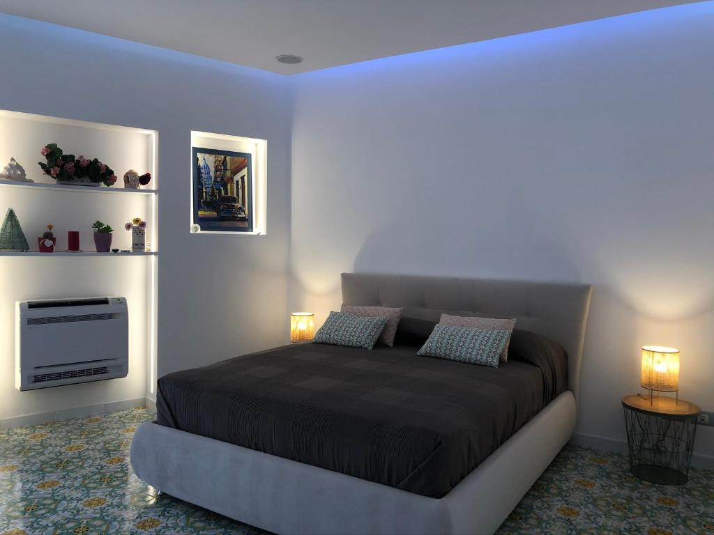 Posteľ alebo postele v izbe v ubytovaní Casa Mami - Luxury Apartment and Pool - Sorrento