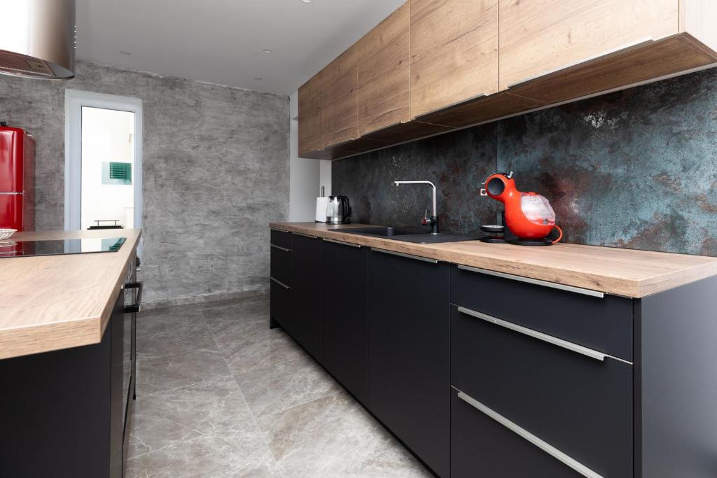 Kuchyňa alebo kuchynka v ubytovaní Luxury Apartman Tinel