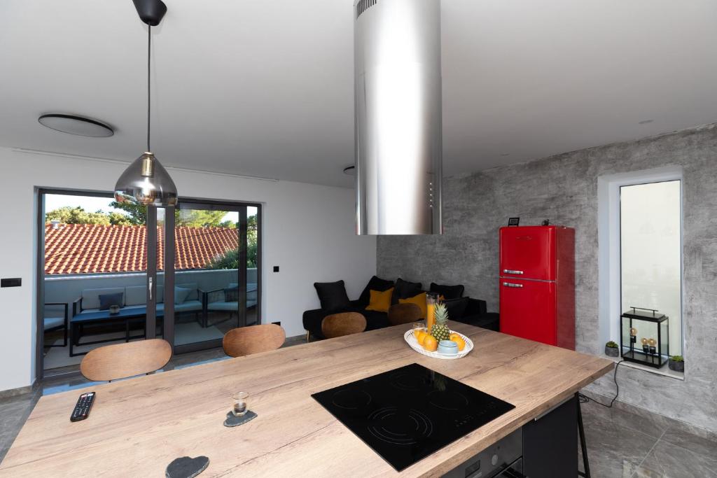 Kuchyňa alebo kuchynka v ubytovaní Luxury Apartman Tinel