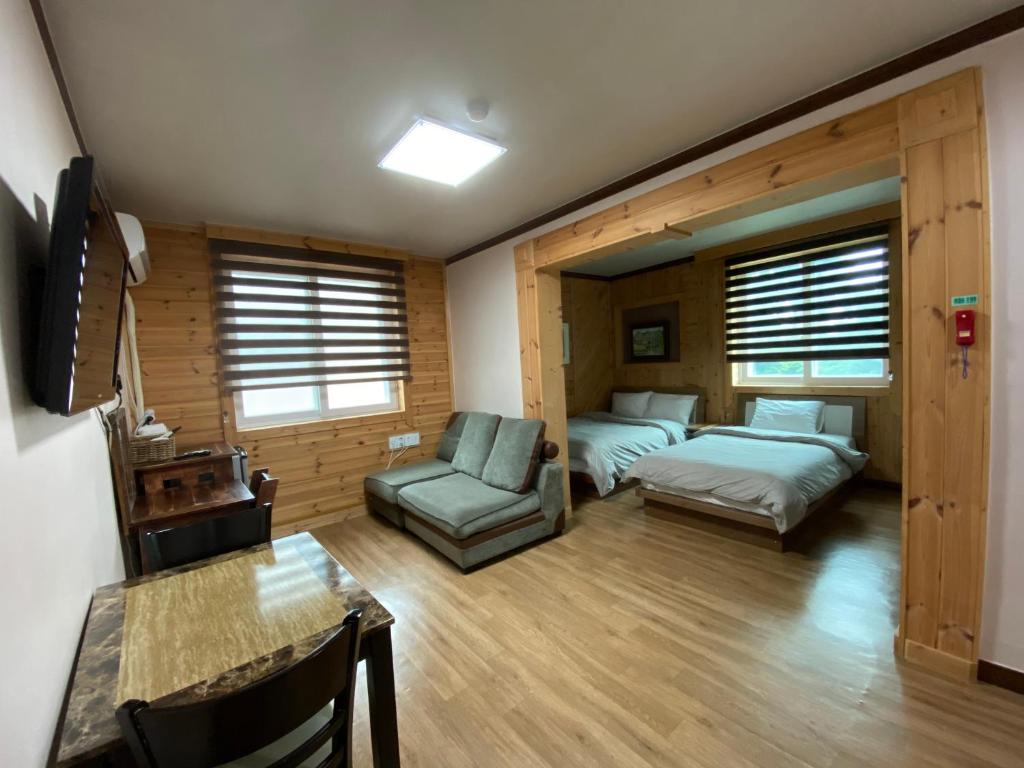 Postel nebo postele na pokoji v ubytování Smile Resort