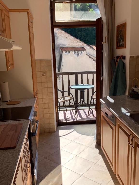 Kuchyň nebo kuchyňský kout v ubytování Apartments Dlouhá 93