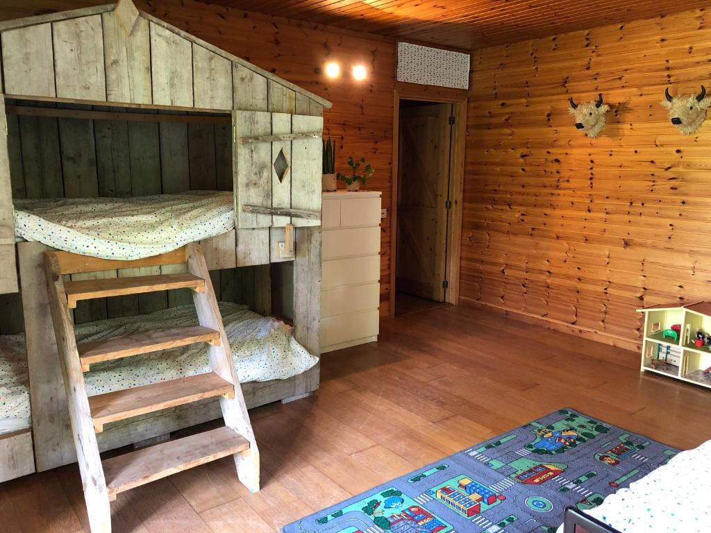 Postel nebo postele na pokoji v ubytování Op den Heust