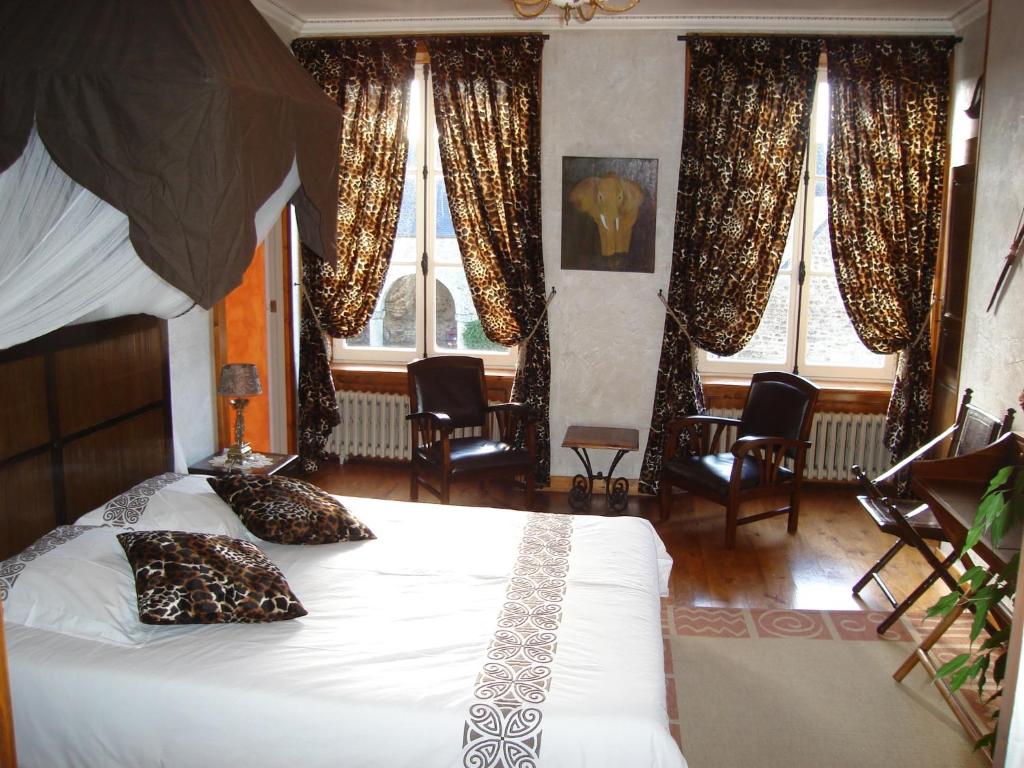 Postel nebo postele na pokoji v ubytování Manoir De Savigny