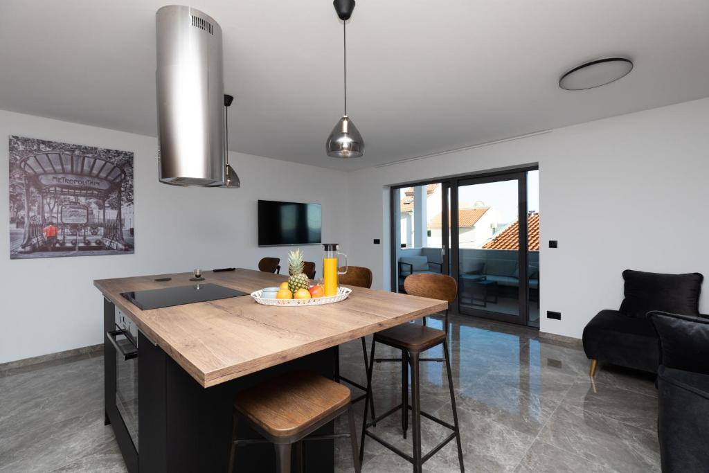 Posedenie v ubytovaní Luxury Apartman Tinel