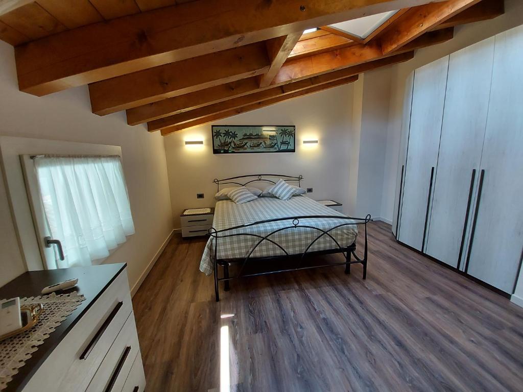 Postel nebo postele na pokoji v ubytování B&B Stella Alpina