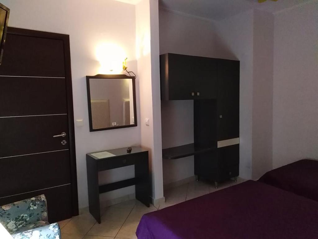 Postel nebo postele na pokoji v ubytování Villa Niki