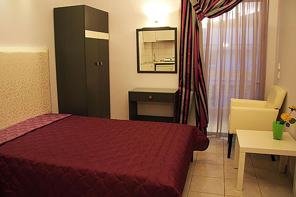 Postel nebo postele na pokoji v ubytování Villa Niki