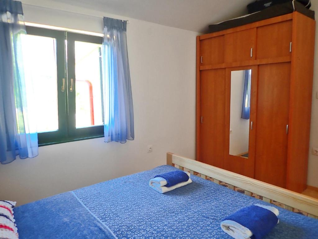 Postel nebo postele na pokoji v ubytování Apartment Adria with seaview