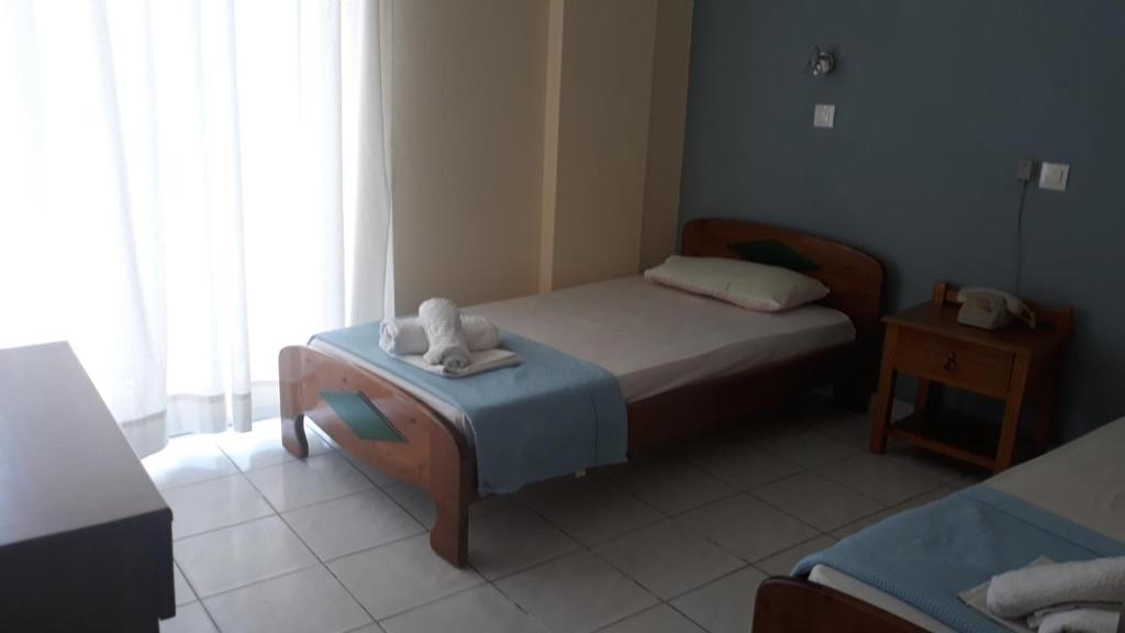 Postel nebo postele na pokoji v ubytování Hotel Lena