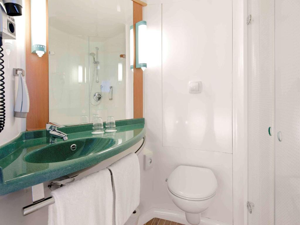 Koupelna v ubytování ibis Hotel München Garching