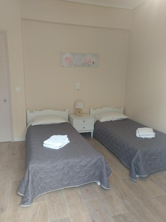 Postel nebo postele na pokoji v ubytování Hotel Διεθνές