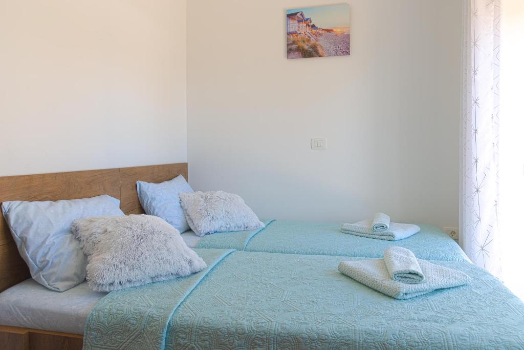 Postel nebo postele na pokoji v ubytování Villa Umag Seafront