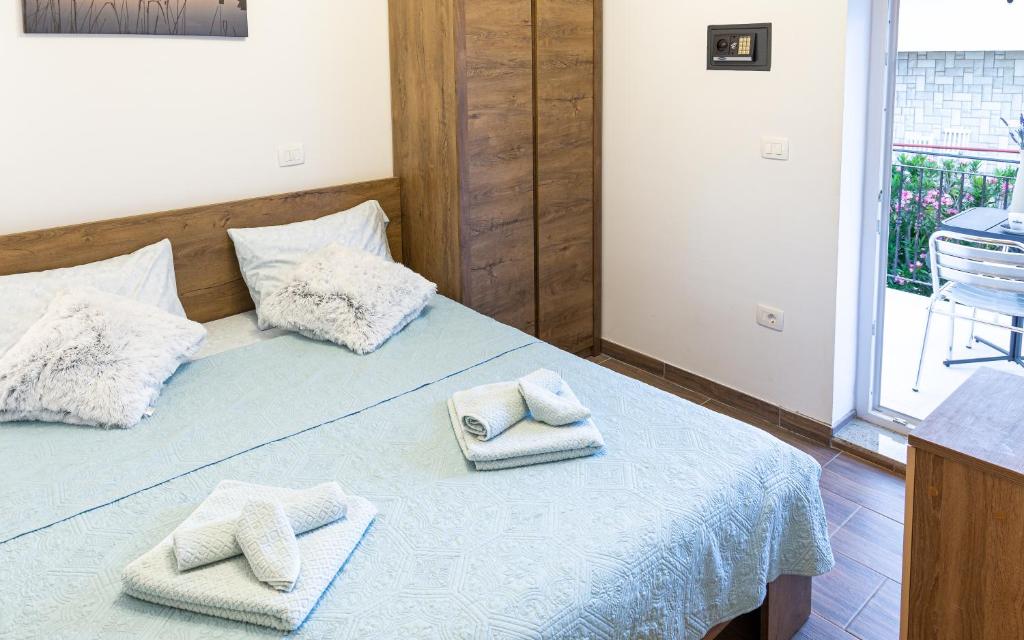 Postel nebo postele na pokoji v ubytování Villa Umag Seafront