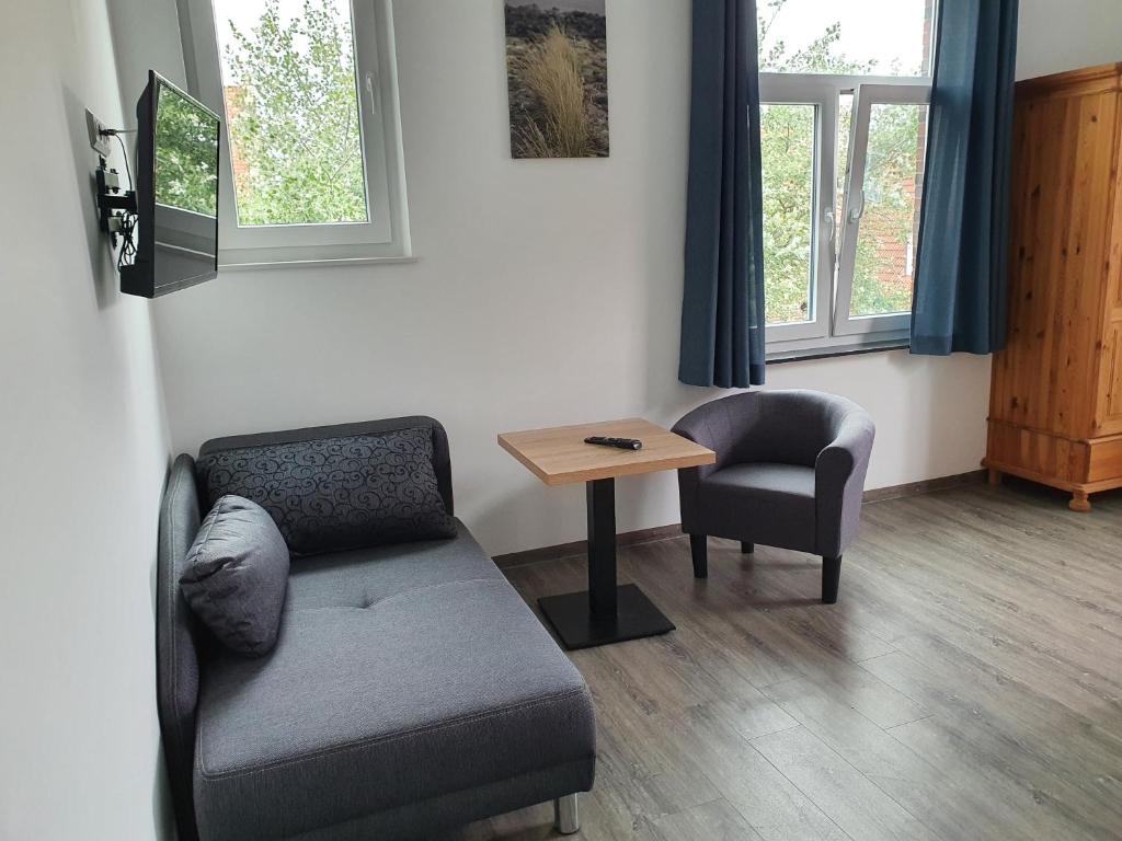 Posezení v ubytování Inselkern Einraum-Apartments