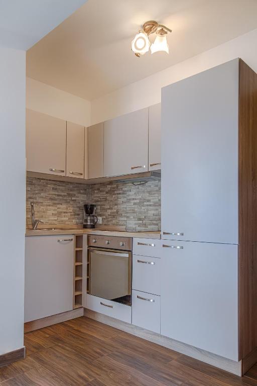 Kuchyň nebo kuchyňský kout v ubytování Villa Umag Seafront