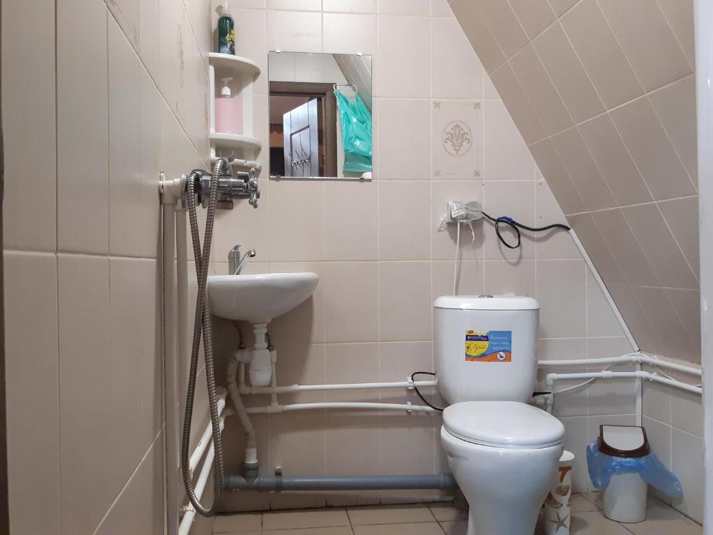 Ванная комната в Hotel Dolina Uyuta