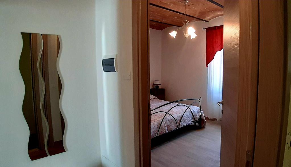 Giường trong phòng chung tại Appartamenti di Luca&Sara